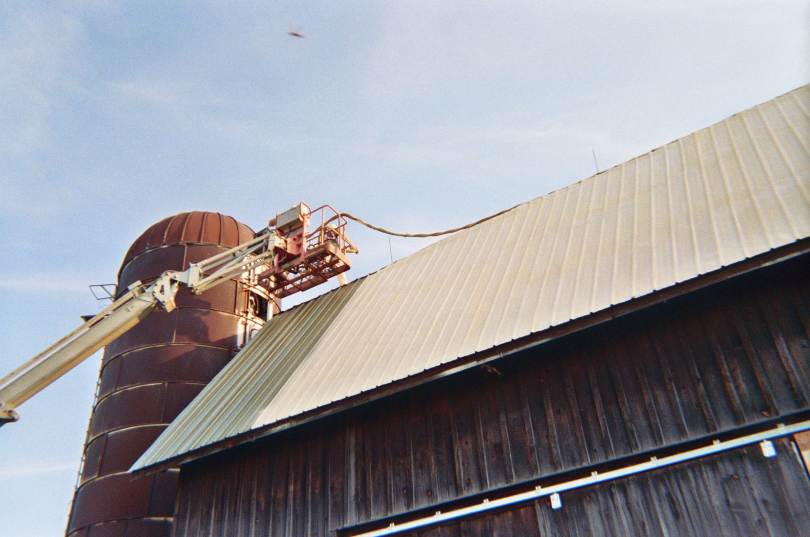 Foam applied to the underside of a barn roof